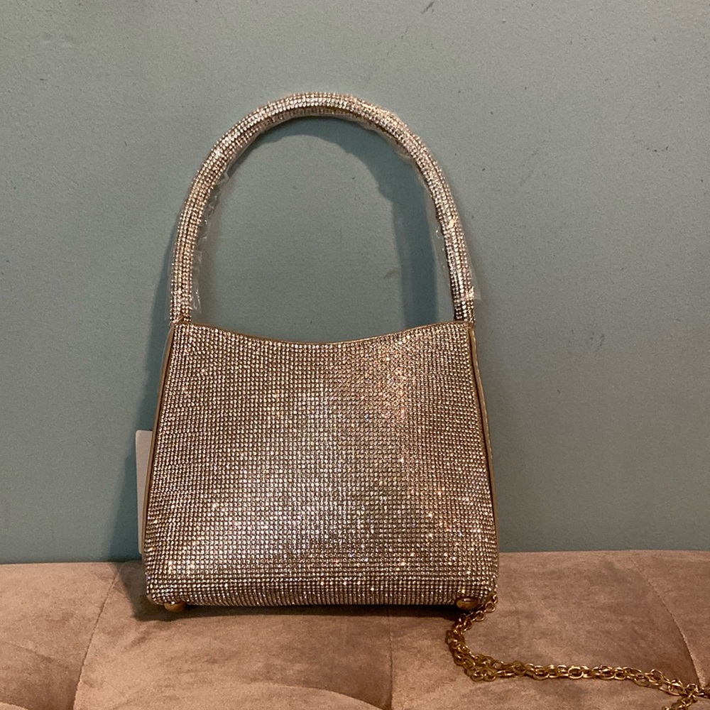 Small rhinestone studded hand bag with gold accents